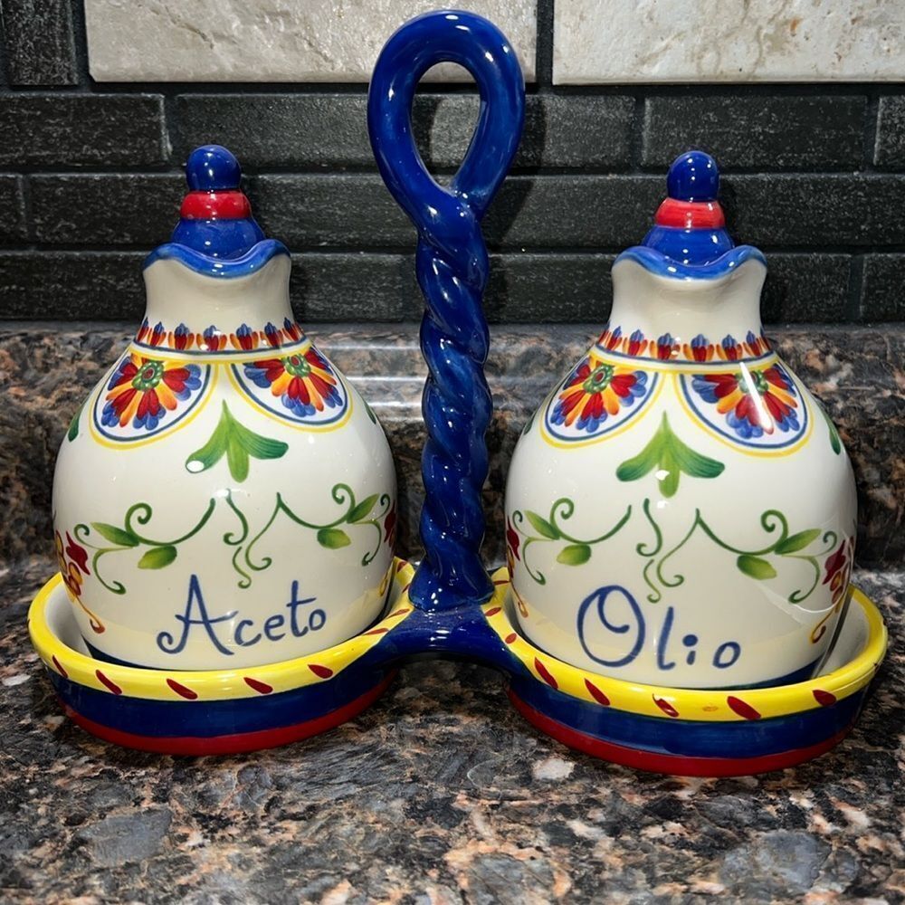 Certified International 
 Oil and Vinegar Set W/Center Handle Ceramic Stand